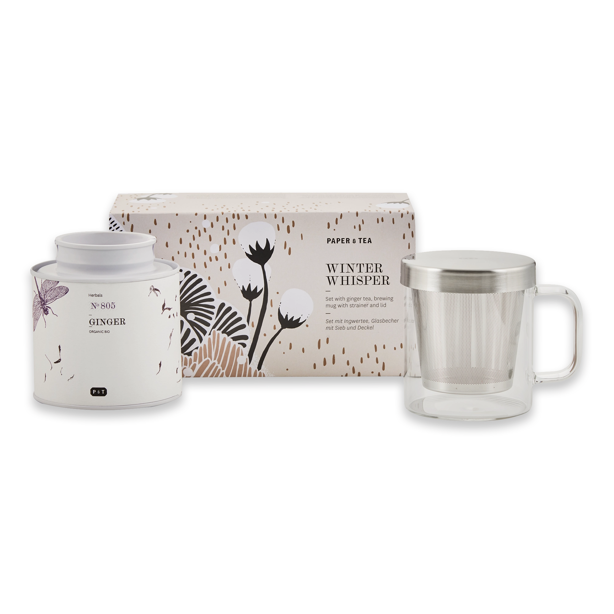 Weiße Tee-Dose mit Ingwertee und Bio-Siegel, beige-schwarze Papier & Tea Geschenkbox, Glasbecher mit Sieb.