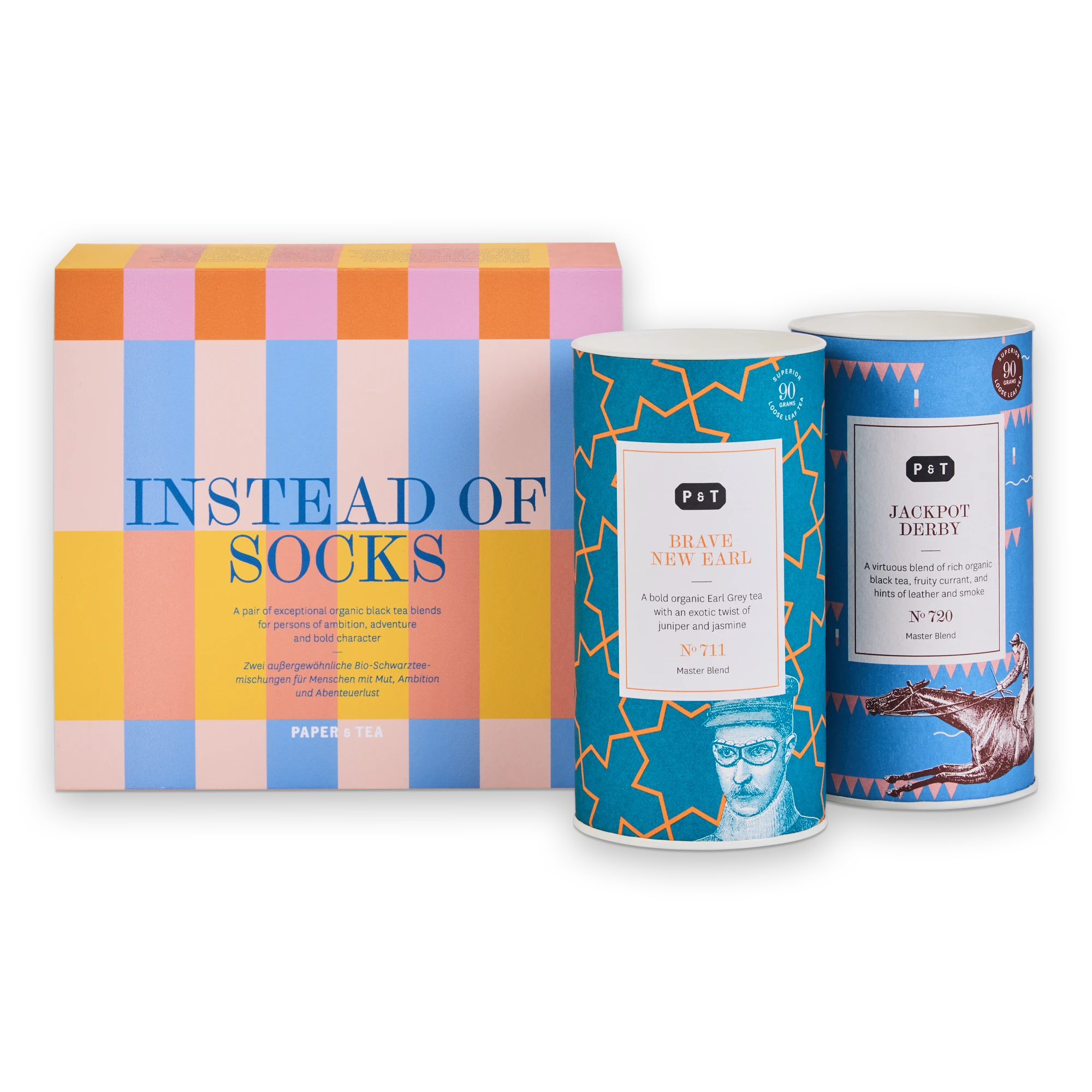 Stilvolles Geschenkset mit bunter Schachtel und zwei blauen Dosen Bio-Schwarztee von PAPER & TEA.